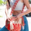 Woman wearing a wayuu bag handmade in Colombia