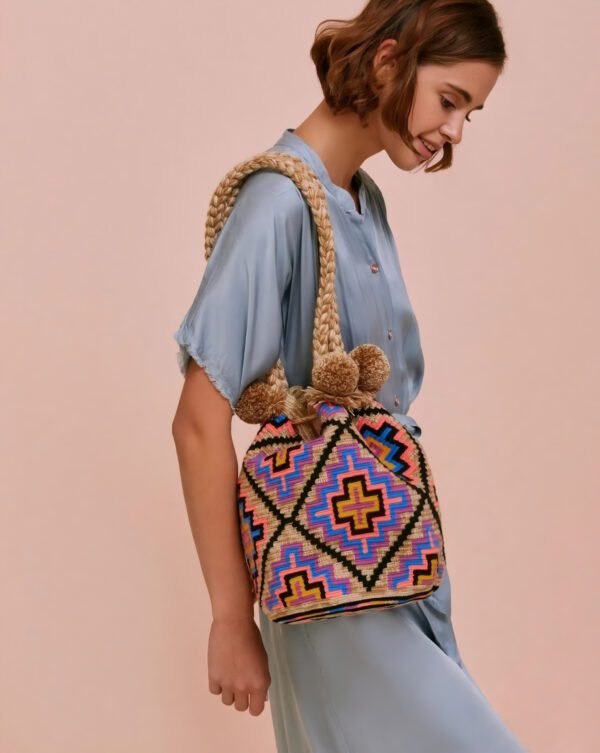 woman wearing a wayuu large bag from colombia